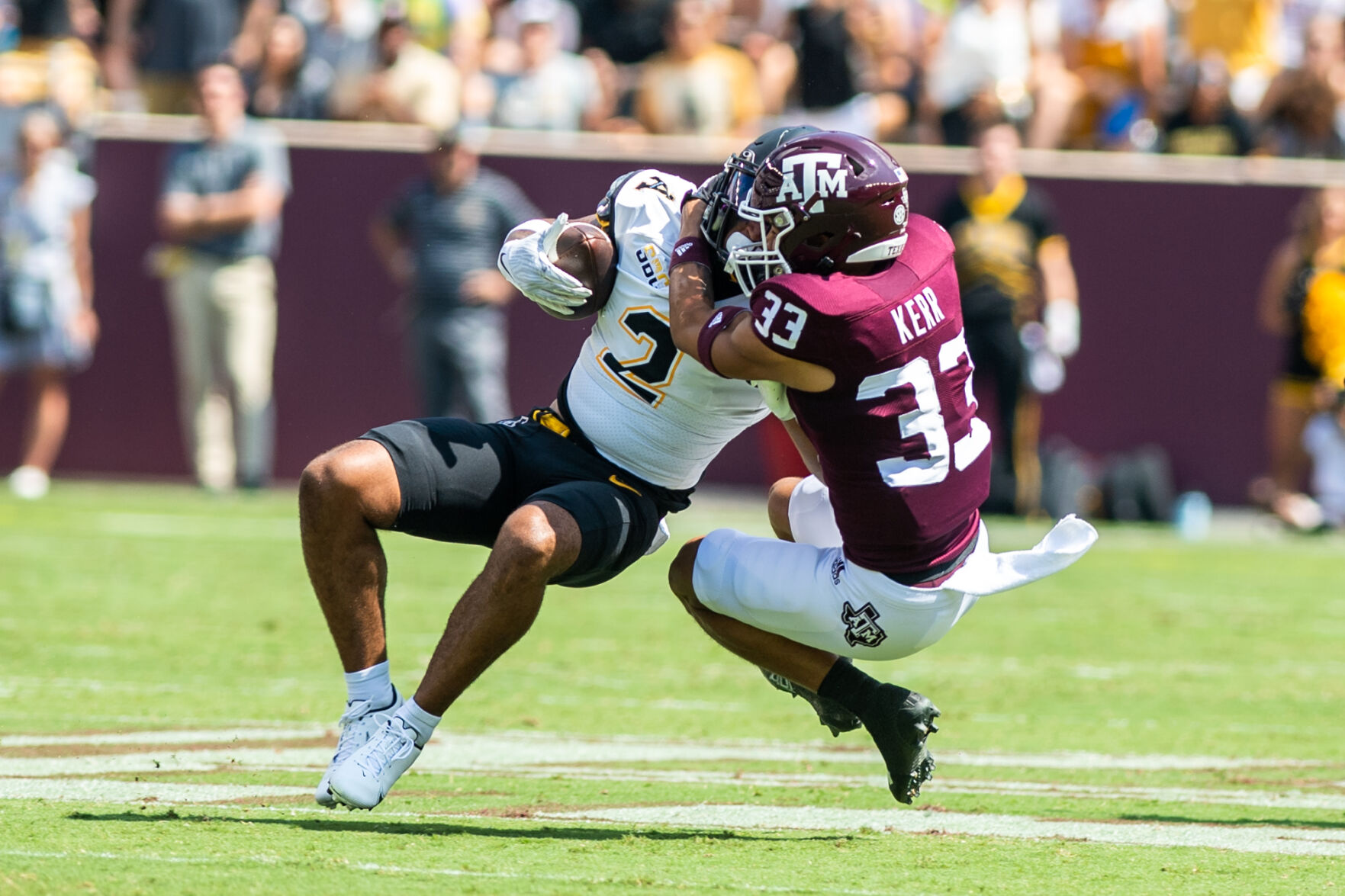 aggie defense tackle wide FRONT PAGE